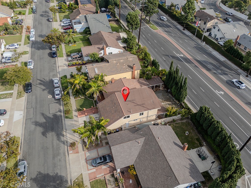518 West Alpine Avenue Santa Ana, CA 92707 - Photo 25 of 29 an aerial view of a house with a yard and potted plants