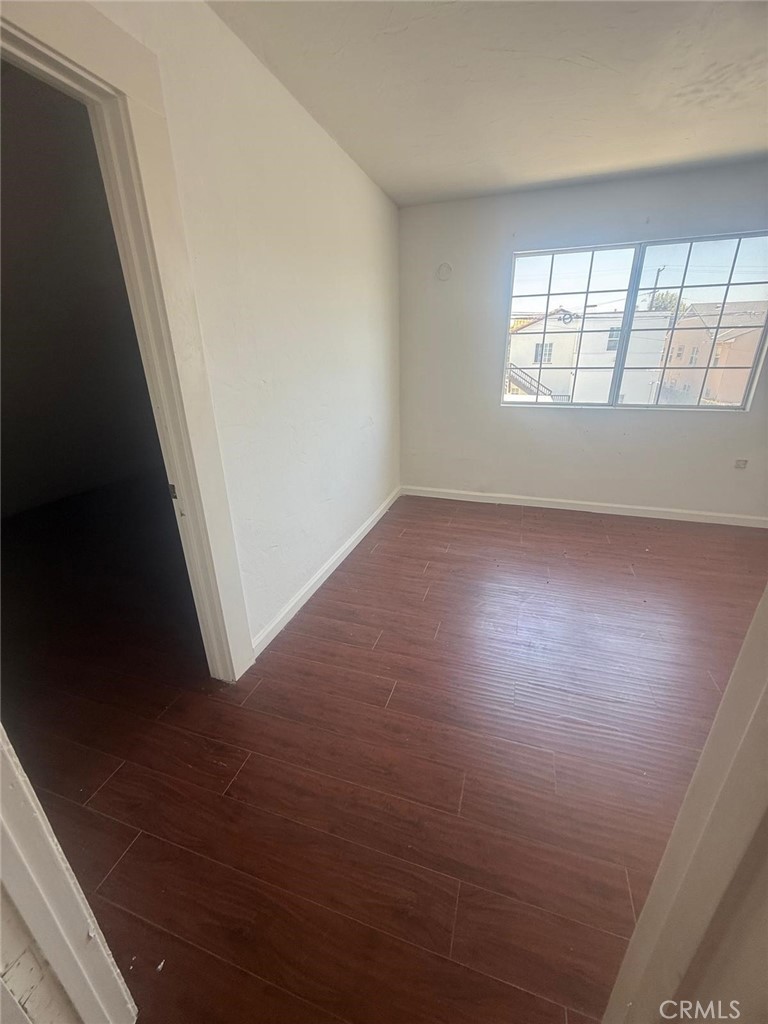 1527 North Broadway, Unit 2 Santa Ana, CA 92701 - Photo 15 of 21 an empty room with windows