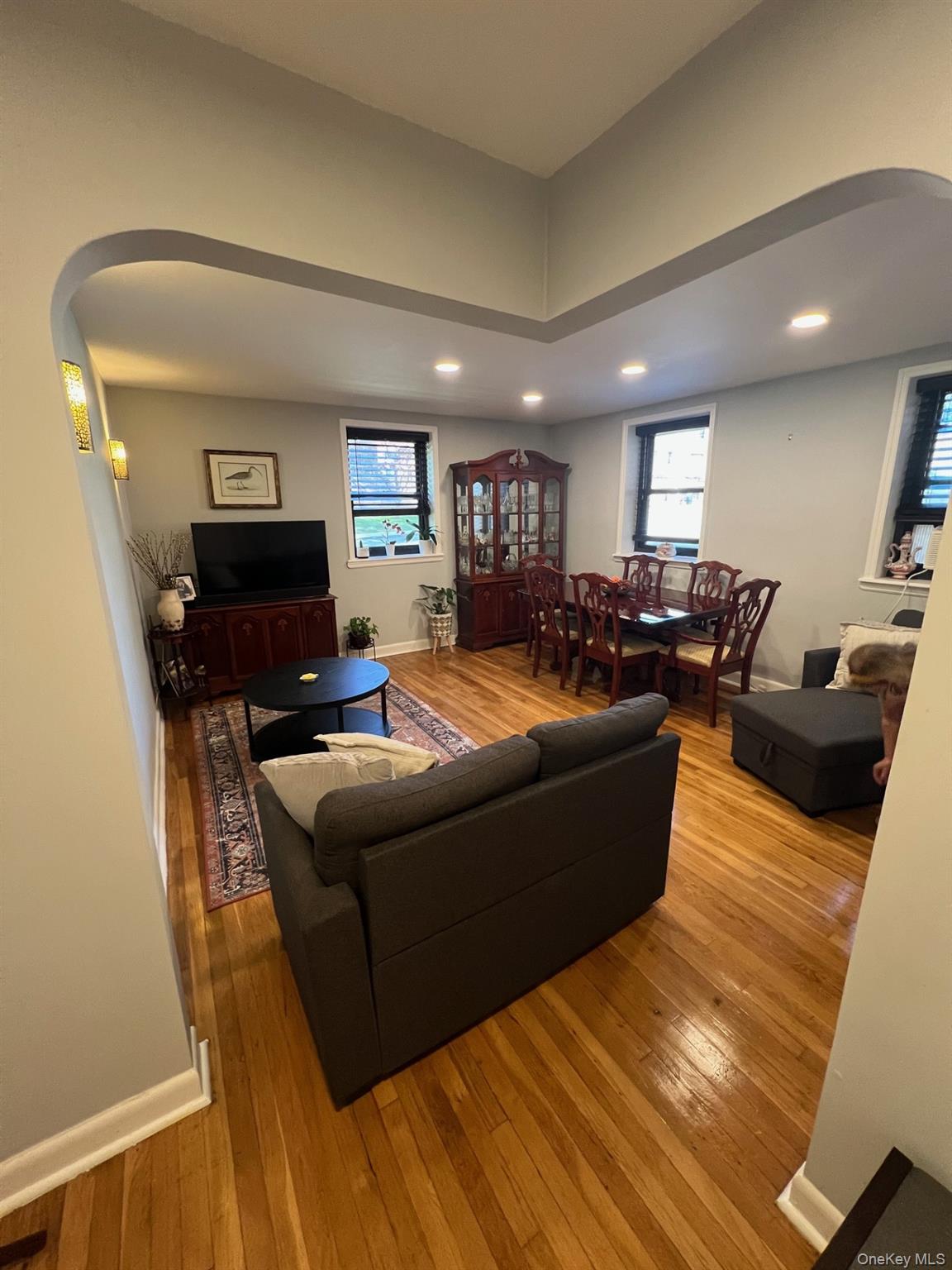 200 Richbell Road, Unit A2 Mamaroneck, NY 10543 - Photo 5 of 14 a living room with furniture and a flat screen tv