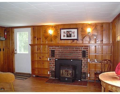 429 West Road Ashby, MA 01431 - Photo 3 of 5 a living room with a fireplace