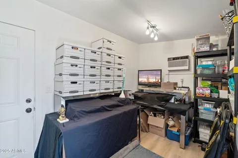 a room with furniture and wooden floor