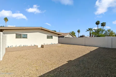 a view of back yard of the house
