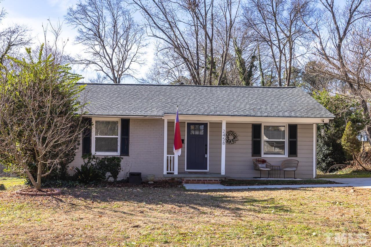 2458 Stevens Road Raleigh, NC 27610 - Photo 1 of 20 front view of a house with a yard