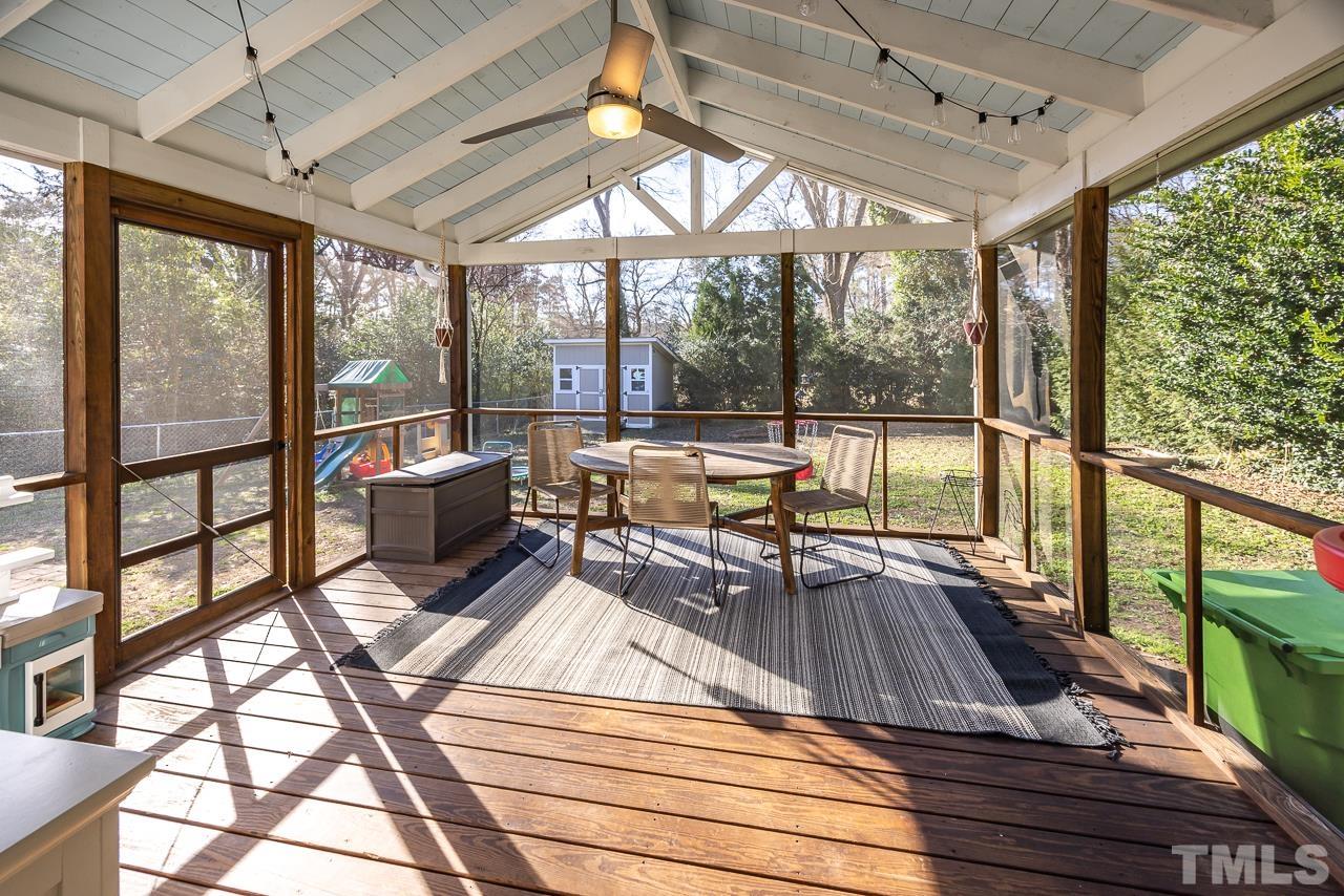 2458 Stevens Road Raleigh, NC 27610 - Photo 14 of 20 a view of a living room and balcony with furniture