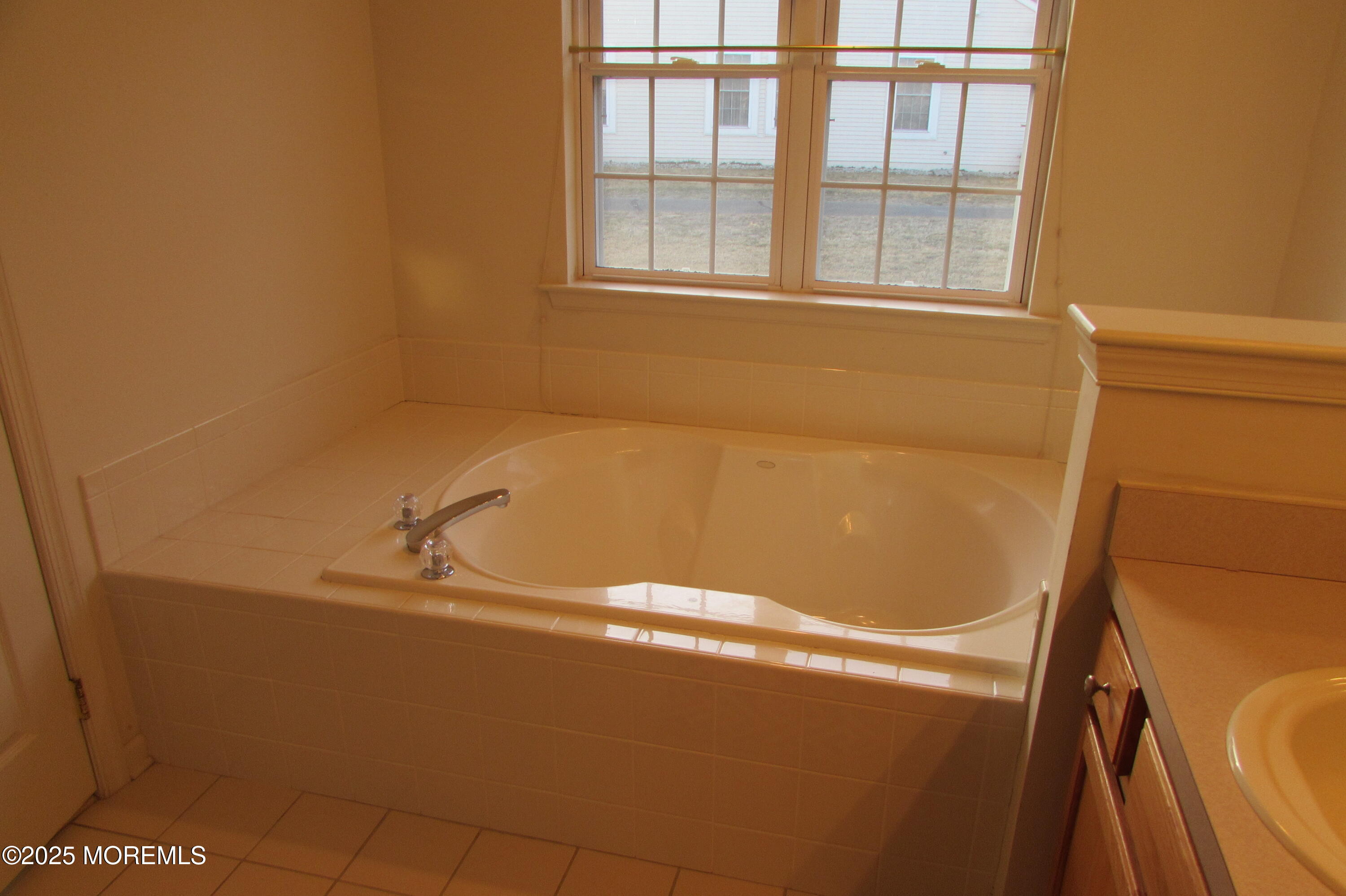 66 Strathmere Street Waretown, NJ 08758 - Photo 13 of 29 a bathroom with a bathtub
