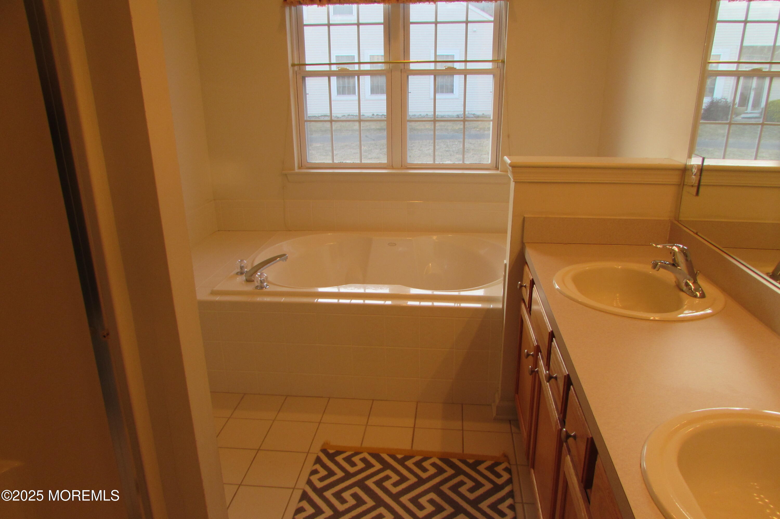 66 Strathmere Street Waretown, NJ 08758 - Photo 14 of 29 a bathroom with a tub