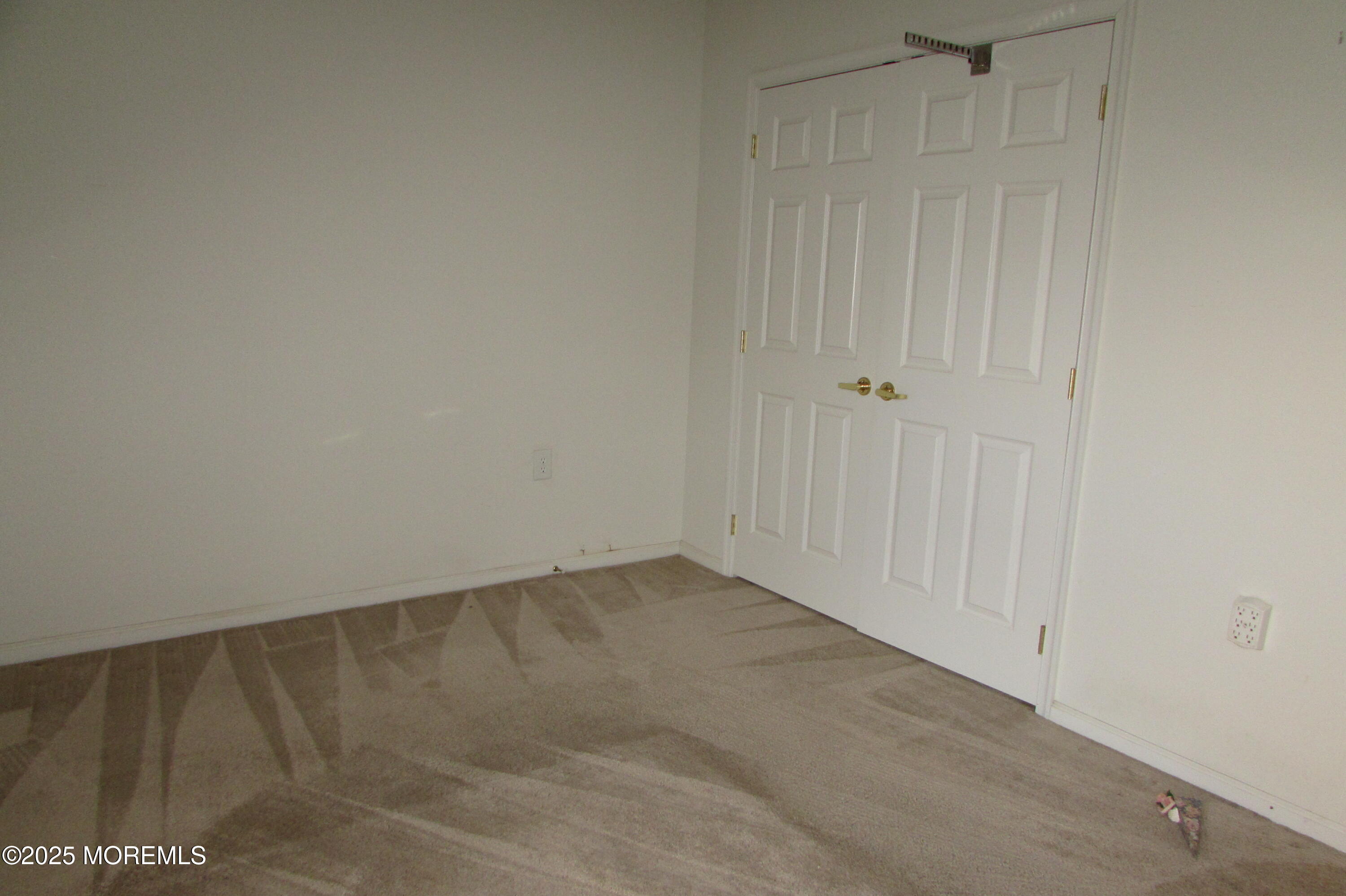 66 Strathmere Street Waretown, NJ 08758 - Photo 17 of 29 a view of an empty room