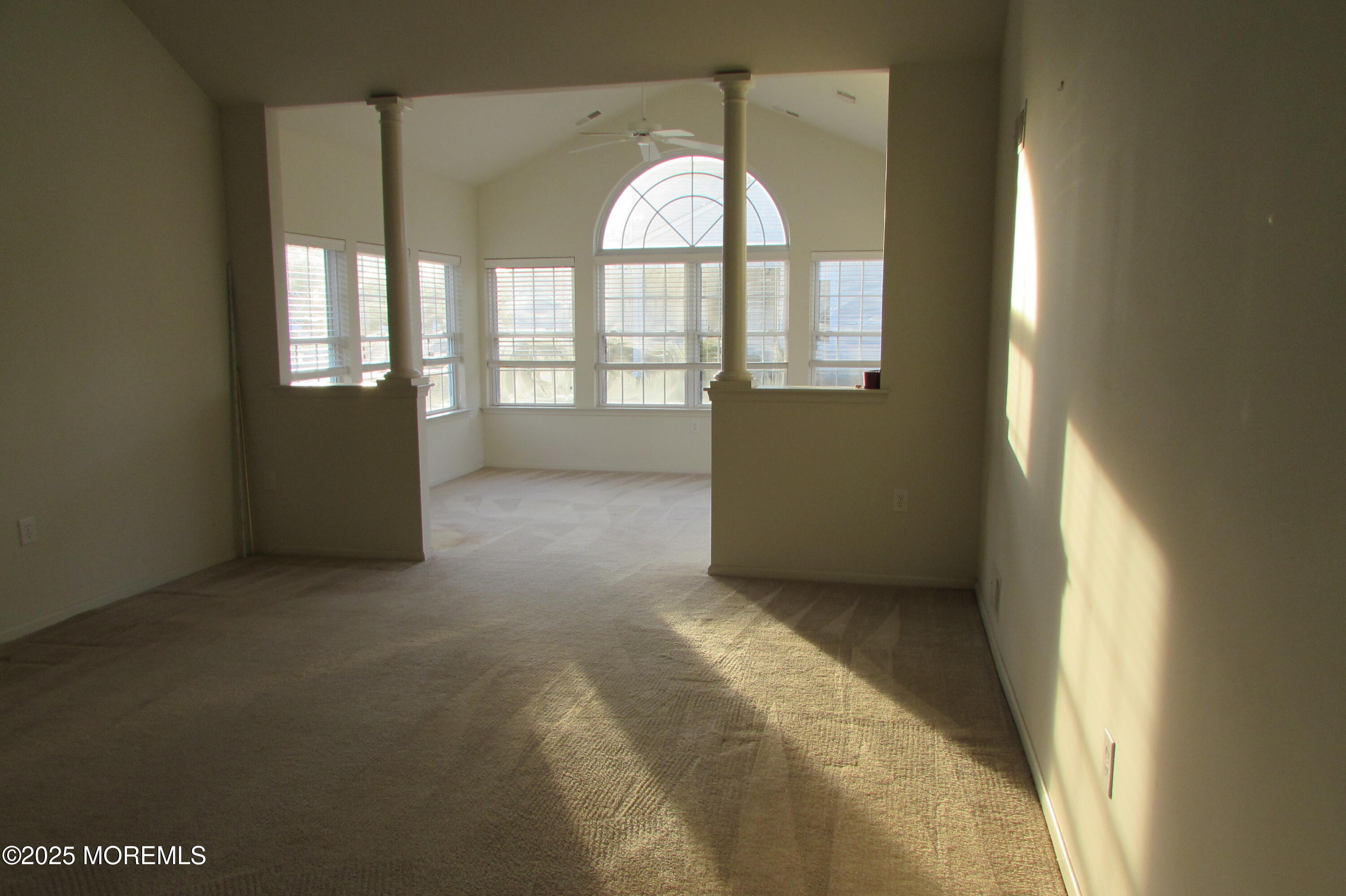66 Strathmere Street Waretown, NJ 08758 - Photo 19 of 29 a view of an empty room and window