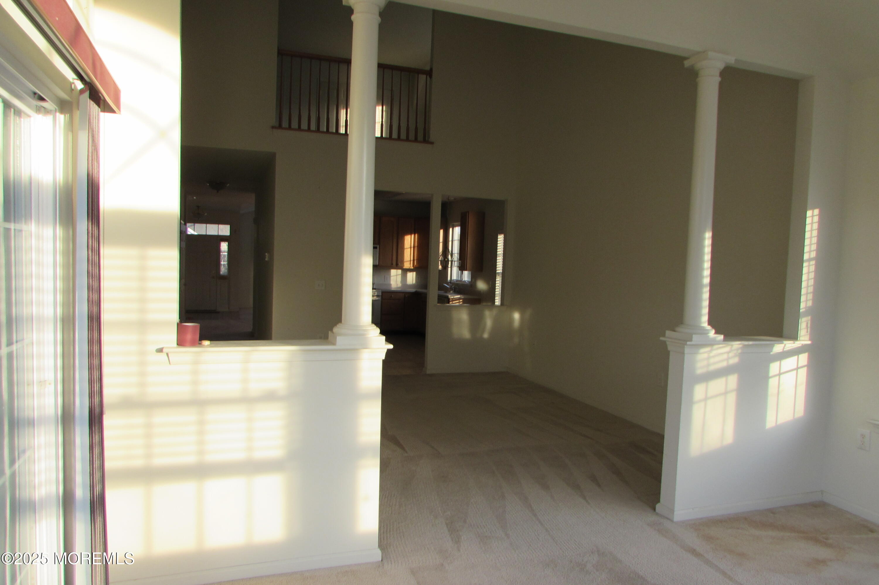 66 Strathmere Street Waretown, NJ 08758 - Photo 21 of 29 a view of a hallway with windows