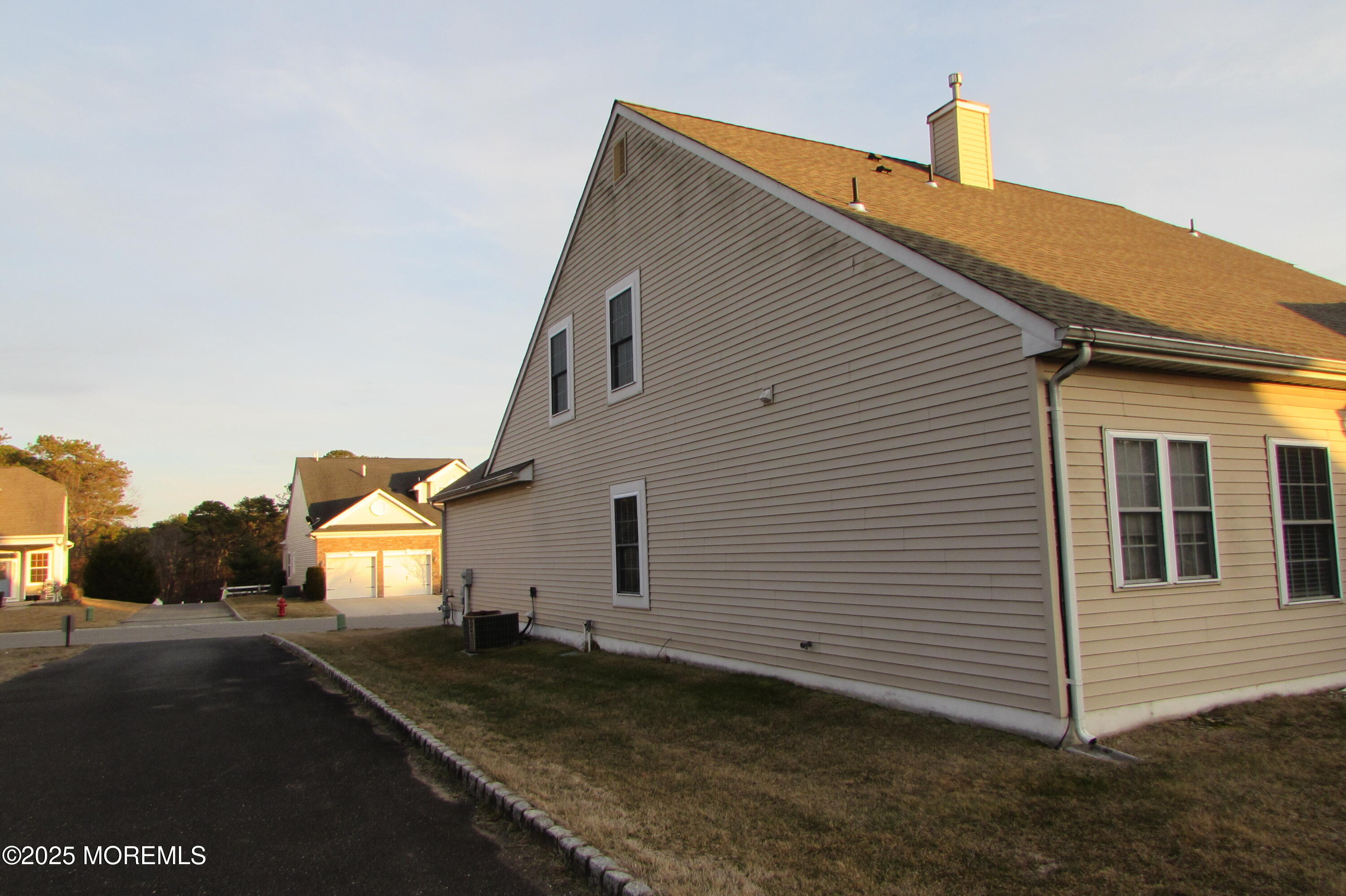66 Strathmere Street Waretown, NJ 08758 - Photo 6 of 29 a view of a house with backyard