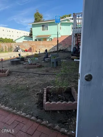 a view of a balcony with wooden floor