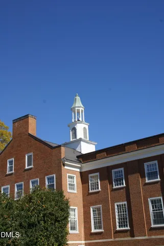 a front view of a building with balcony