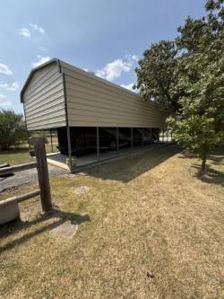 8165 Jackson Road Krum, TX 76249 - Photo 30 of 33 Luxury RV storage with power is 18'x50'