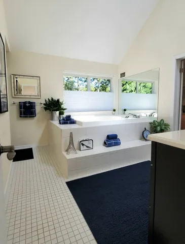 a kitchen with a sink a stove and a refrigerator