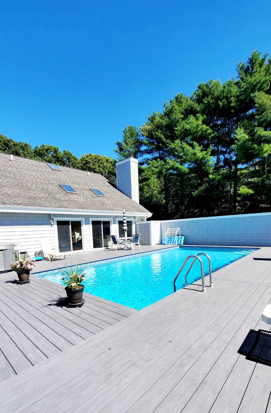 Undisclosed Address Remsenburg, NY 11960 - Photo 16 of 17 a view of house with outdoor space and swimming pool