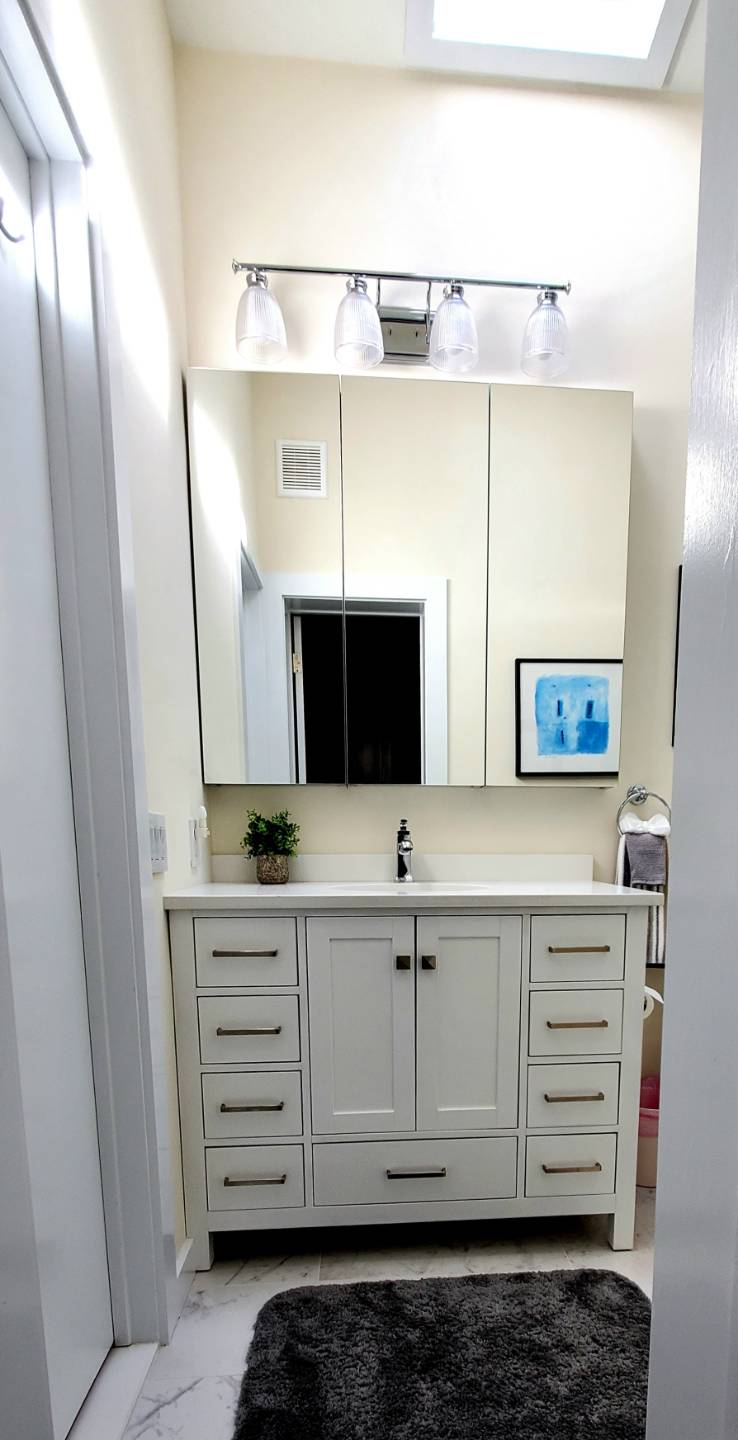 Undisclosed Address Remsenburg, NY 11960 - Photo 9 of 17 a bathroom with a sink and a mirror