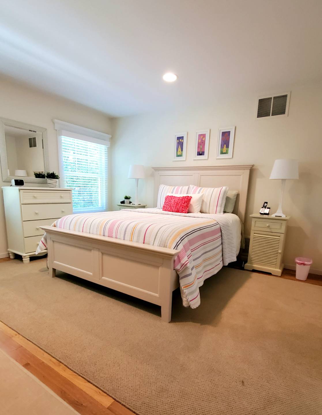 Undisclosed Address Remsenburg, NY 11960 - Photo 10 of 17 a bedroom with a bed and a couch