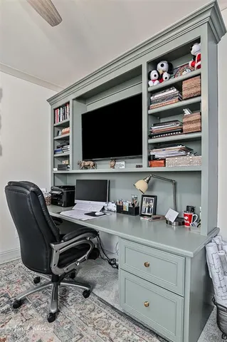 a view of a workspace with furniture