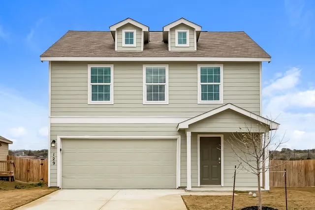 a front view of residential houses