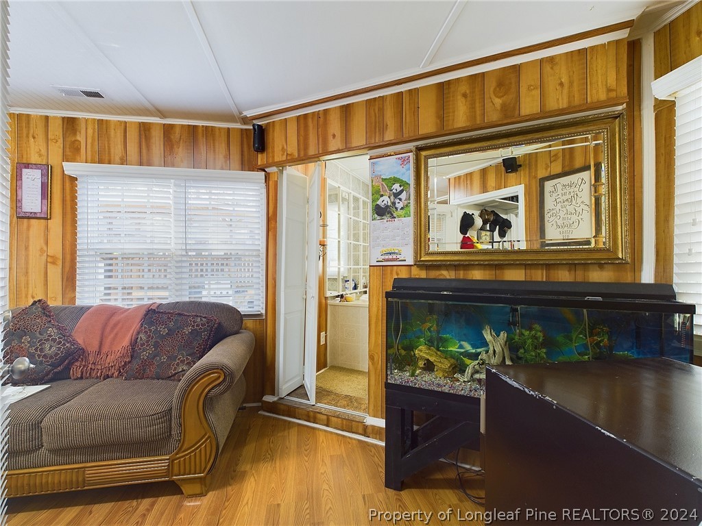 6948 Rockfish Road Raeford, NC 28376 - Photo 28 of 39 a living room with a couch