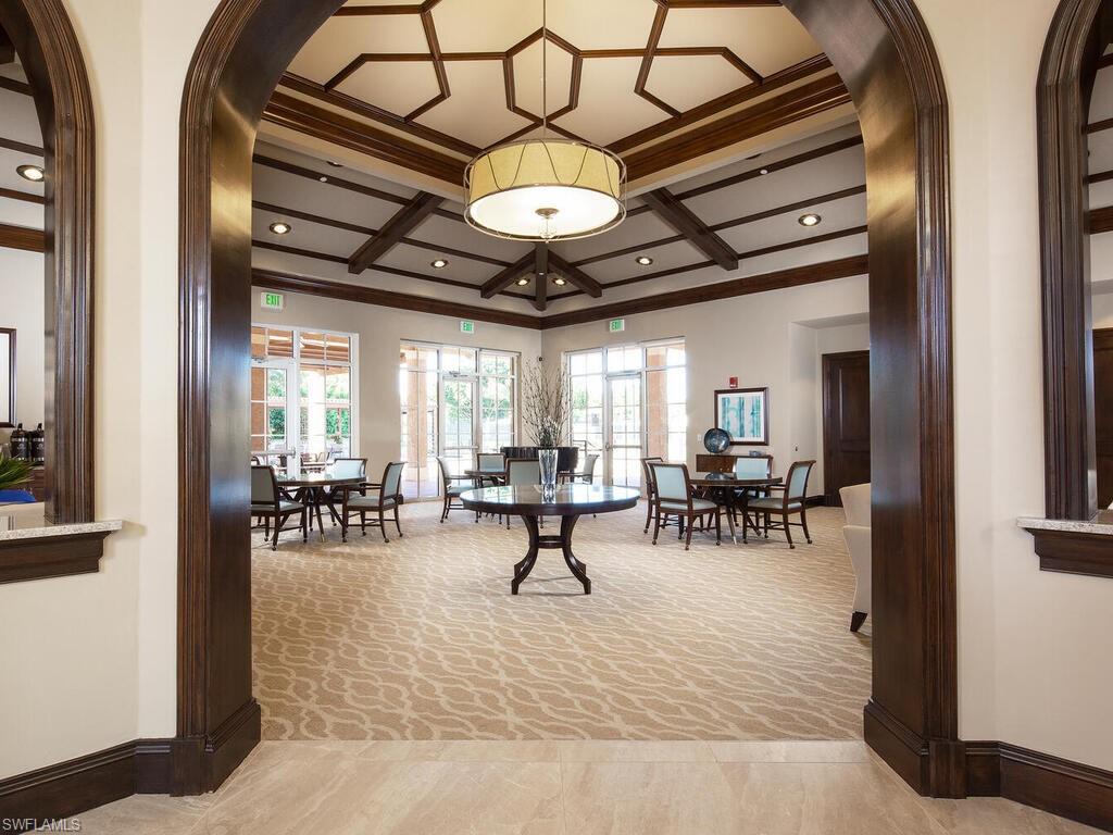 1770 Marsh Run Naples, FL 34109 - Photo 30 of 33 a view of a room with lots of furniture and a chandelier
