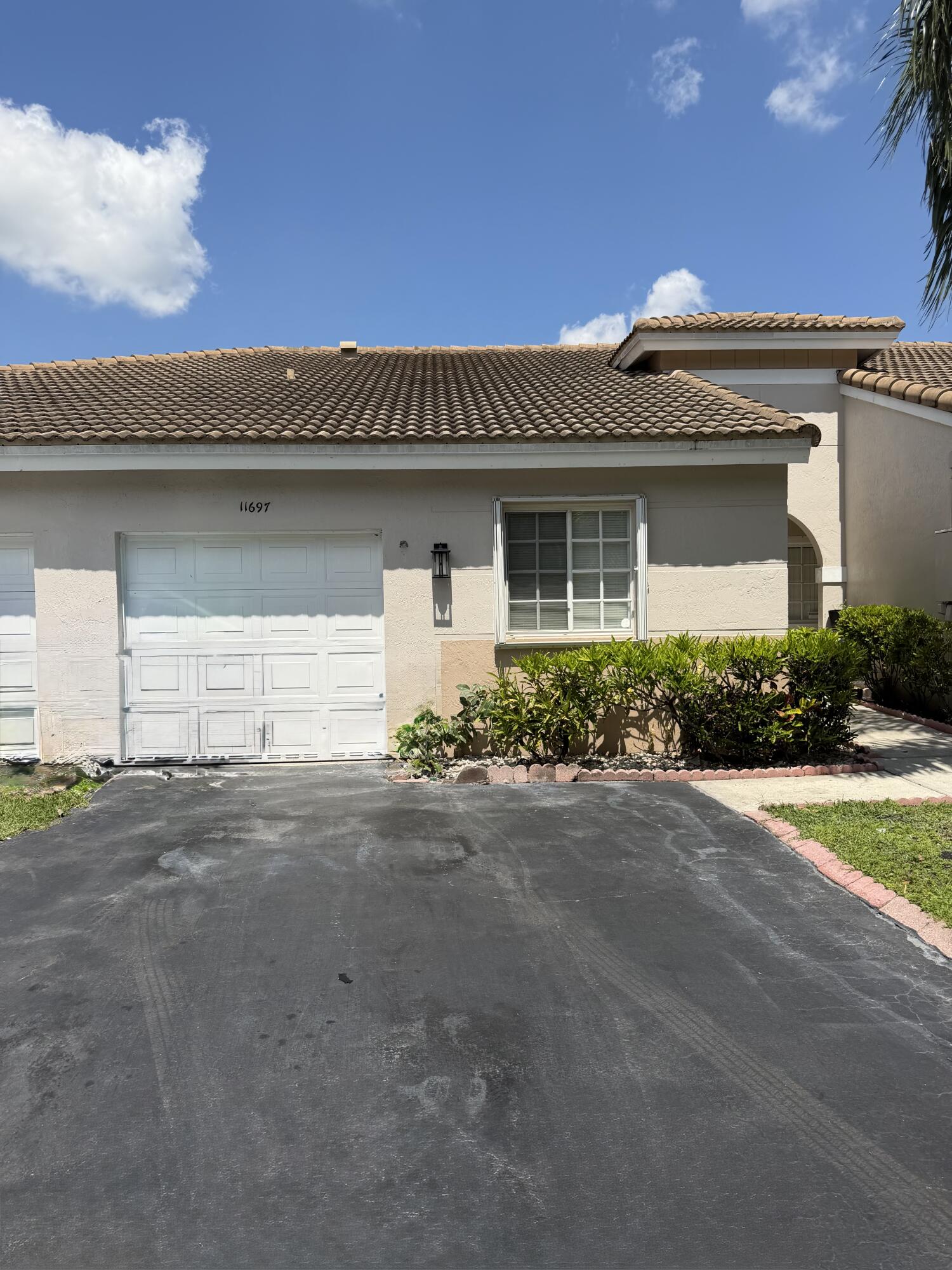 11697 Southwest 19th Street Miramar, FL 33025 - Photo 1 of 48 front view of a house