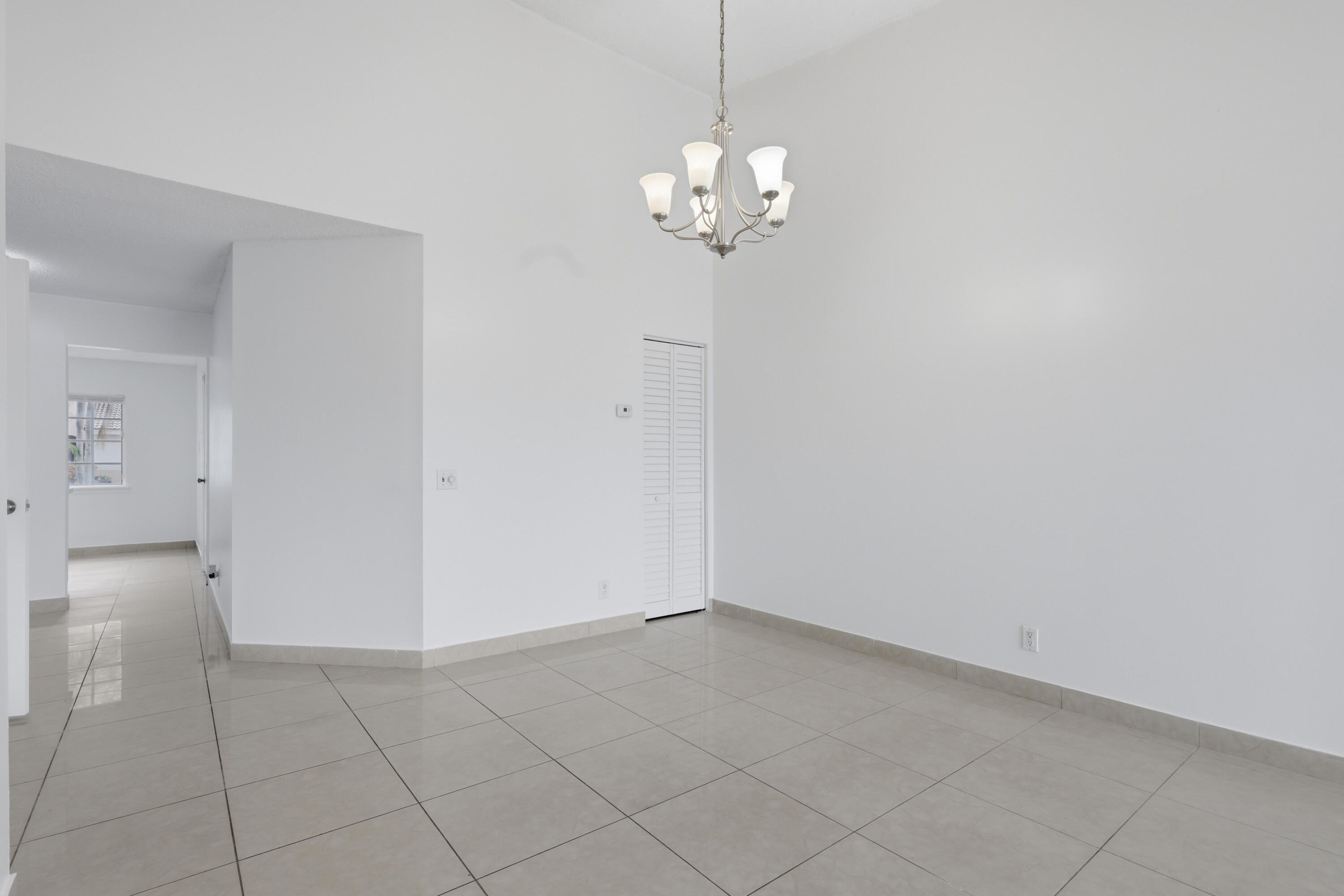 11697 Southwest 19th Street Miramar, FL 33025 - Photo 38 of 48 a view of livingroom with chandelier