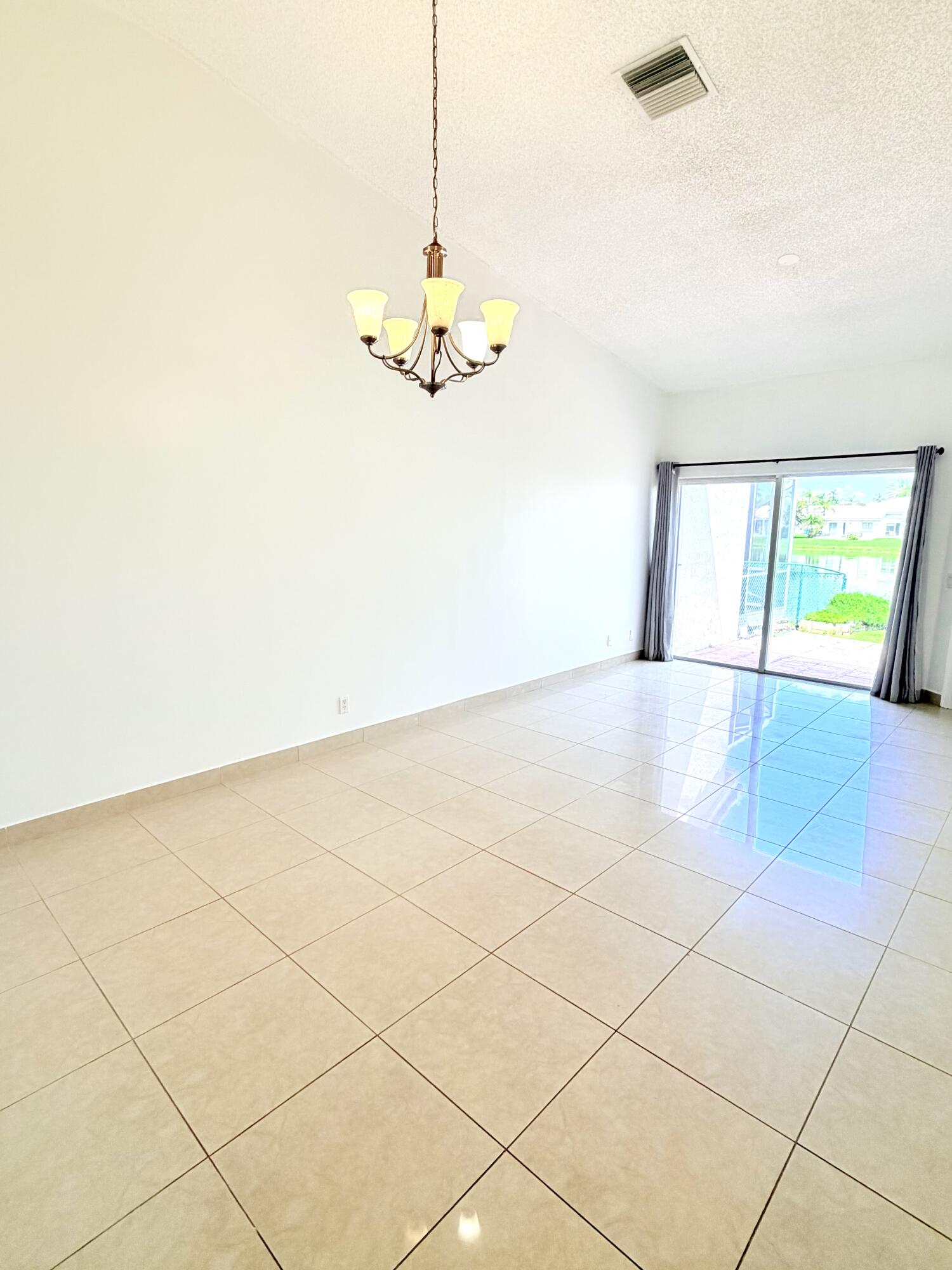 11697 Southwest 19th Street Miramar, FL 33025 - Photo 6 of 48 a view of a room with a dishwasher and a table