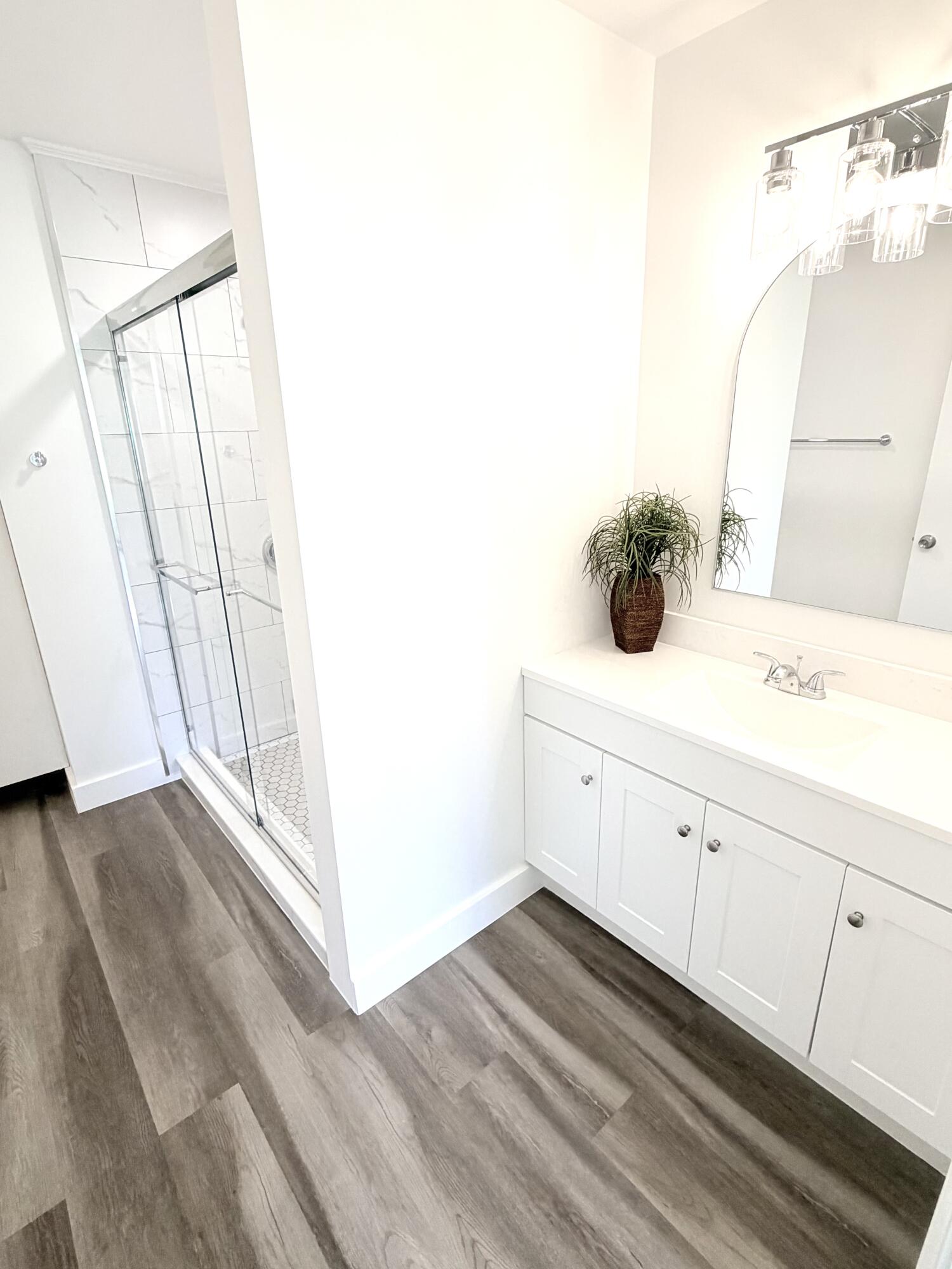 11697 Southwest 19th Street Miramar, FL 33025 - Photo 9 of 48 a bathroom with a sink and a mirror