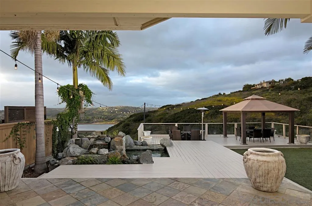 1836 Hawk View Drive Encinitas, CA 92024 - Photo 21 of 25 a view of a patio with couches and potted plants