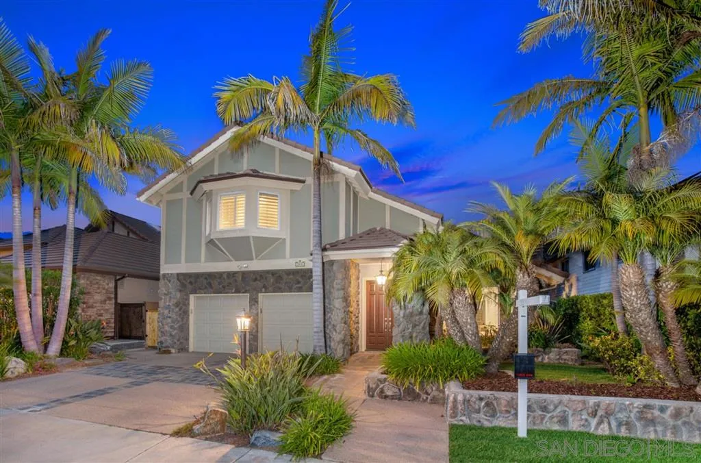 1836 Hawk View Drive Encinitas, CA 92024 - Photo 3 of 25 a front view of a house with a palm tree