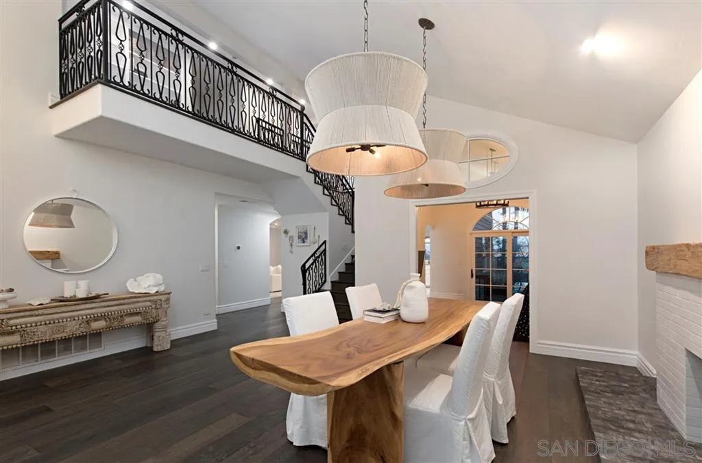1836 Hawk View Drive Encinitas, CA 92024 - Photo 5 of 25 a view of a dining room with furniture window and wooden floor