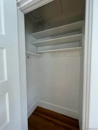 a view of small space with racks on the wall