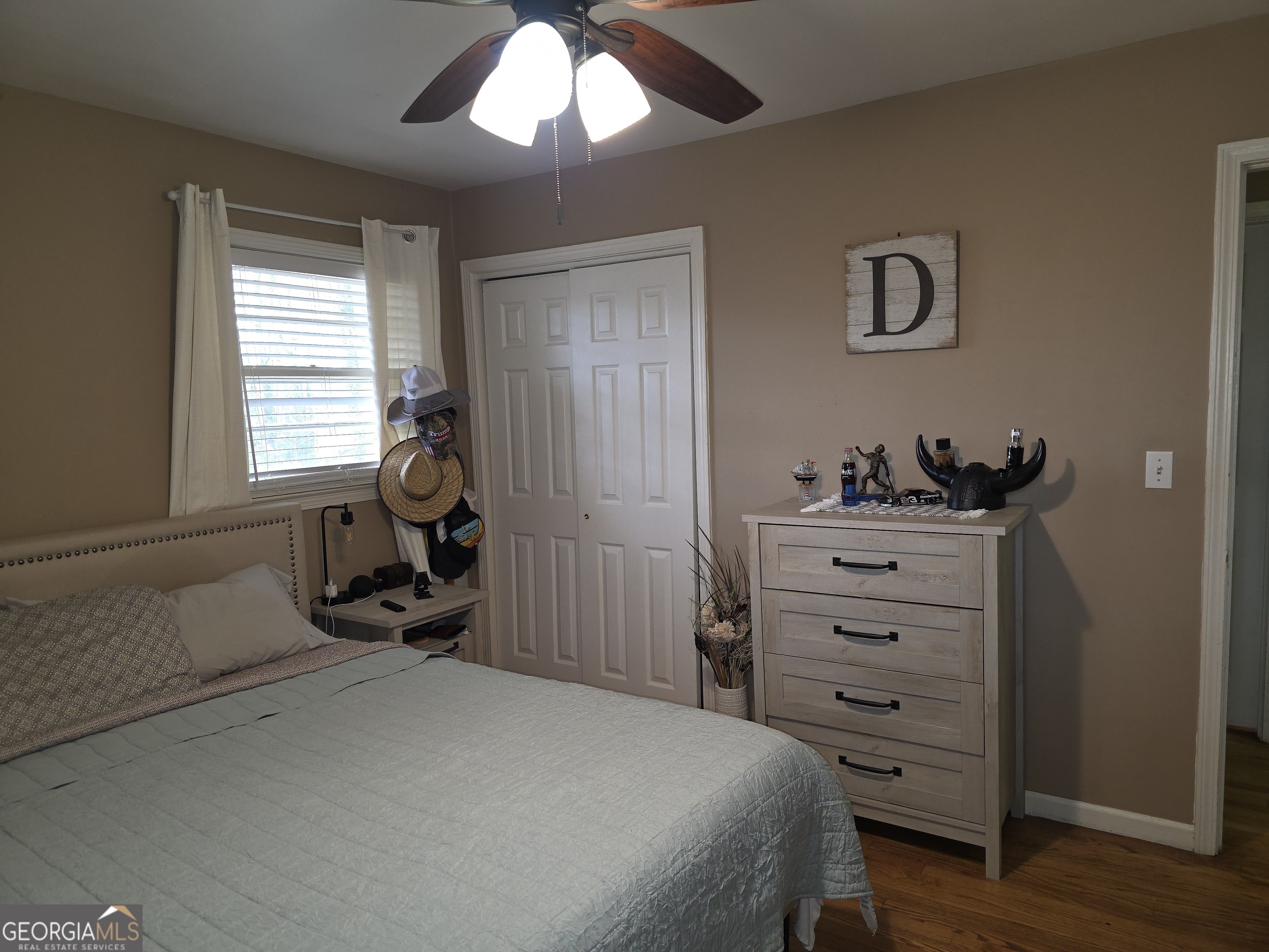 731 Seabreeze Lake Road Buchanan, GA 30113 - Photo 15 of 34 a bedroom with a bed and a window