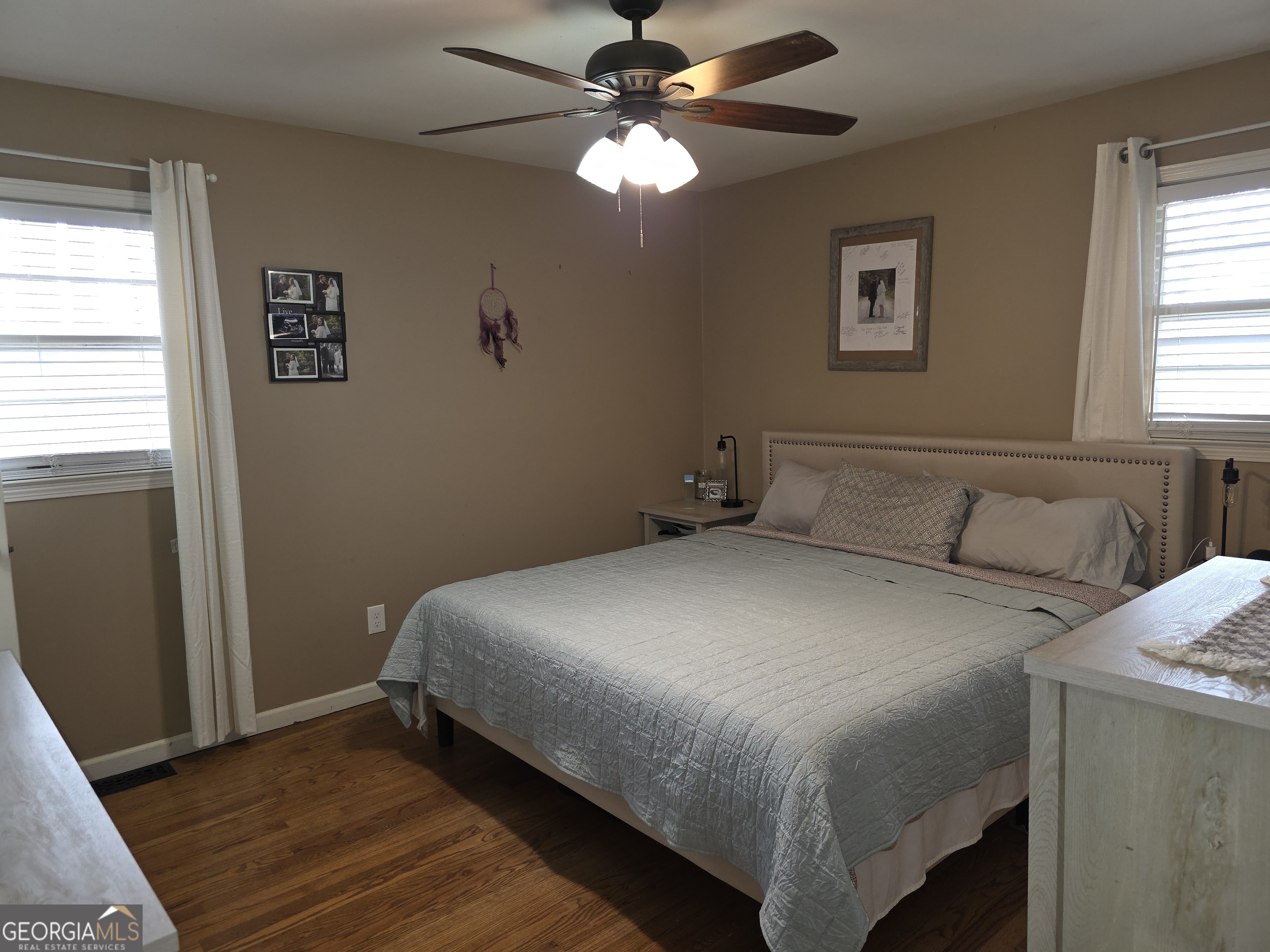 731 Seabreeze Lake Road Buchanan, GA 30113 - Photo 16 of 34 a bedroom with a bed and a window