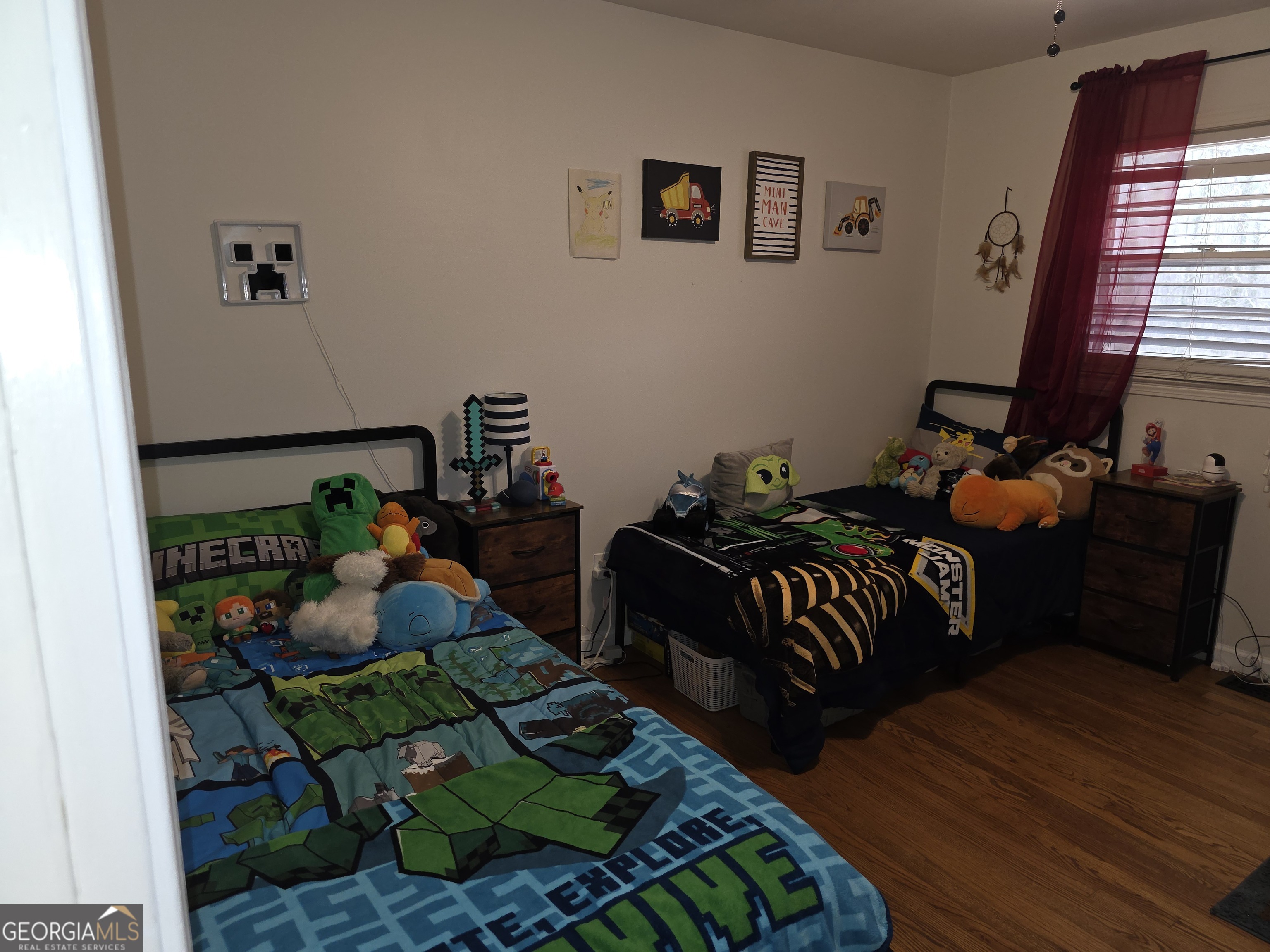 731 Seabreeze Lake Road Buchanan, GA 30113 - Photo 20 of 34 a bedroom with bed and a window