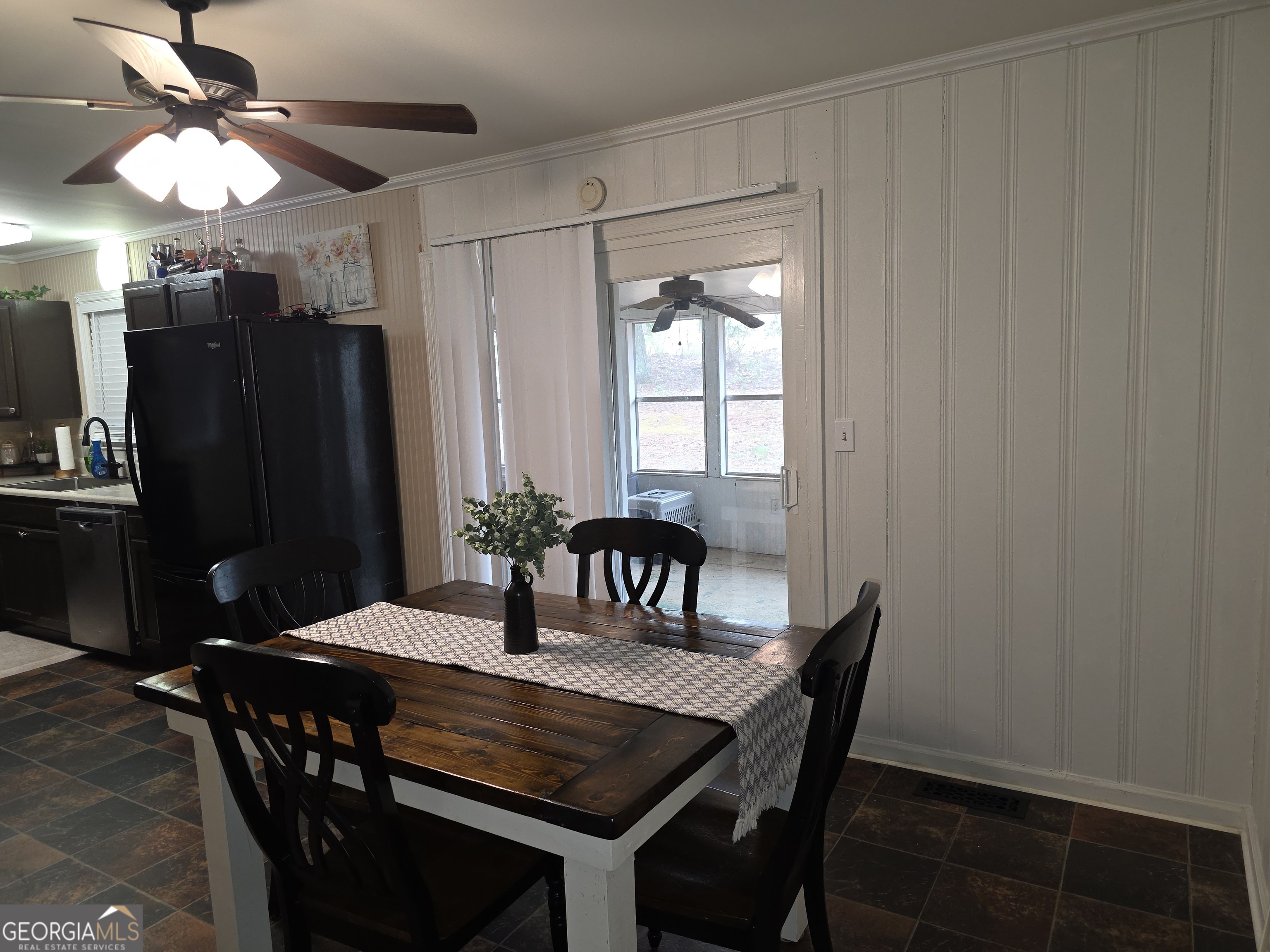 731 Seabreeze Lake Road Buchanan, GA 30113 - Photo 9 of 34 a view of a dining room with furniture and chandelier