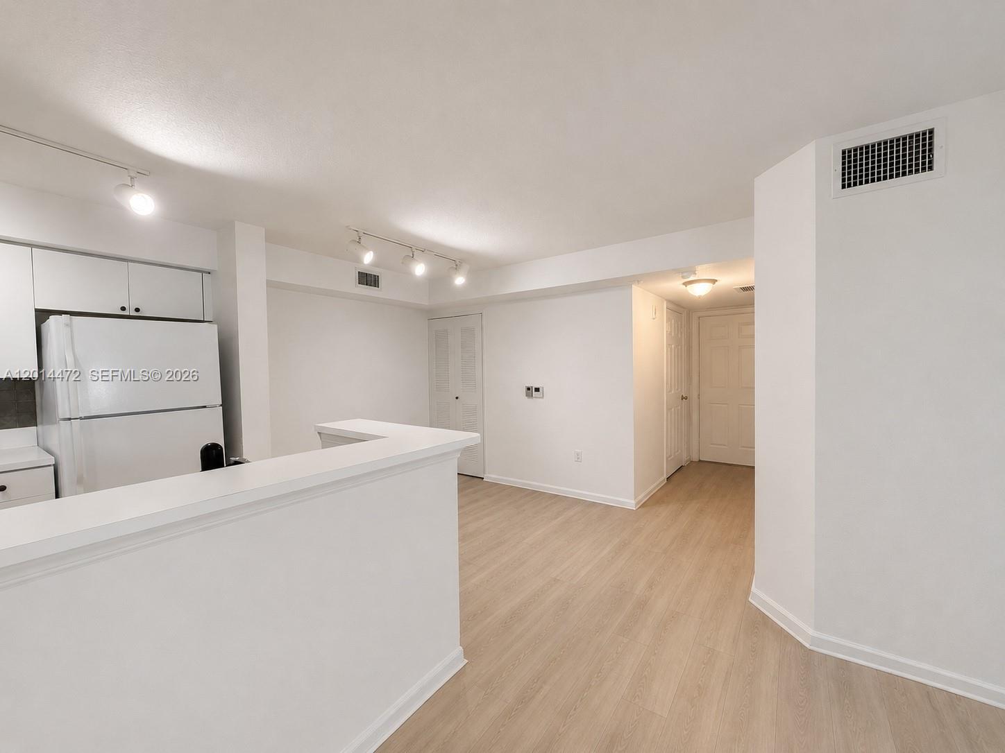 15410 Southwest 284th Street, Unit 8102 Homestead, FL 33033 - Photo 2 of 18 a view of an empty room