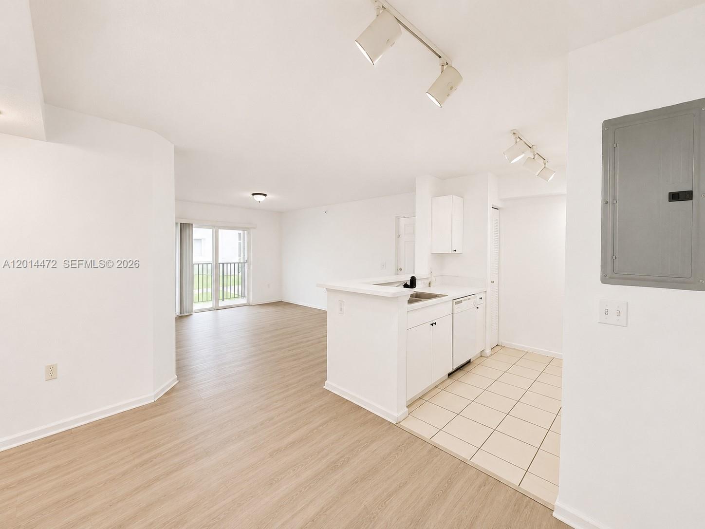 15410 Southwest 284th Street, Unit 8102 Homestead, FL 33033 - Photo 3 of 18 a view of a kitchen with electric appliances