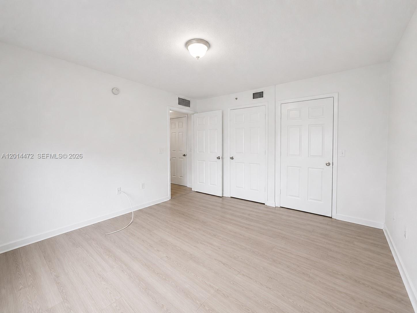15410 Southwest 284th Street, Unit 8102 Homestead, FL 33033 - Photo 7 of 18 a view of an empty room