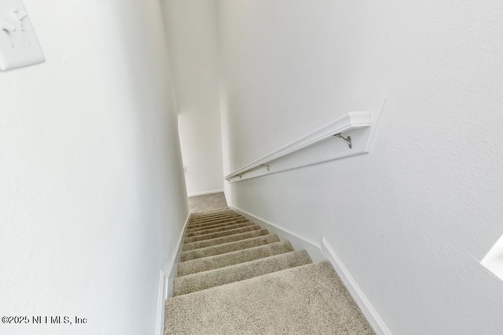 187 Cougar Road Jacksonville, FL 32220 - Photo 36 of 44 Stairs with soaring ceililngs