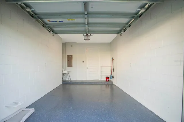 a view of empty room with stairs