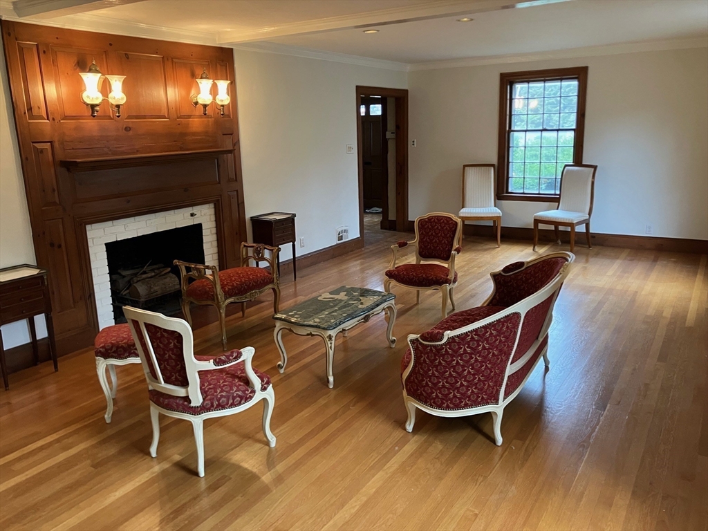 3 Glenoe Road Brookline, MA 02467 - Photo 3 of 12 a living room with furniture and a fireplace