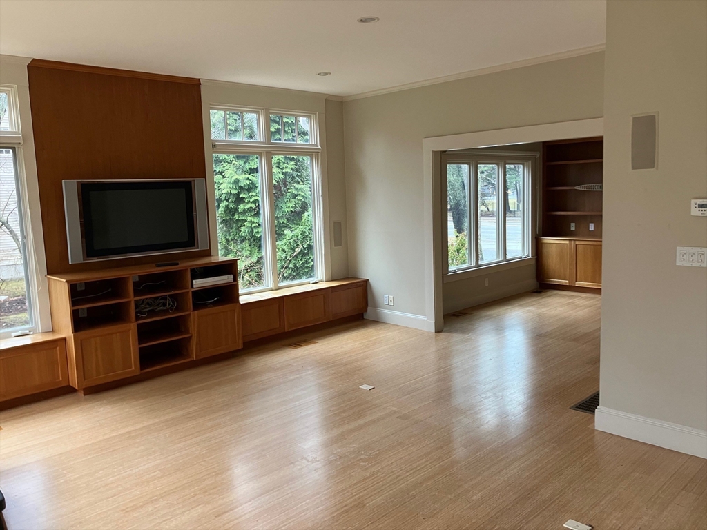 3 Glenoe Road Brookline, MA 02467 - Photo 6 of 12 a living room with furniture and a flat screen tv