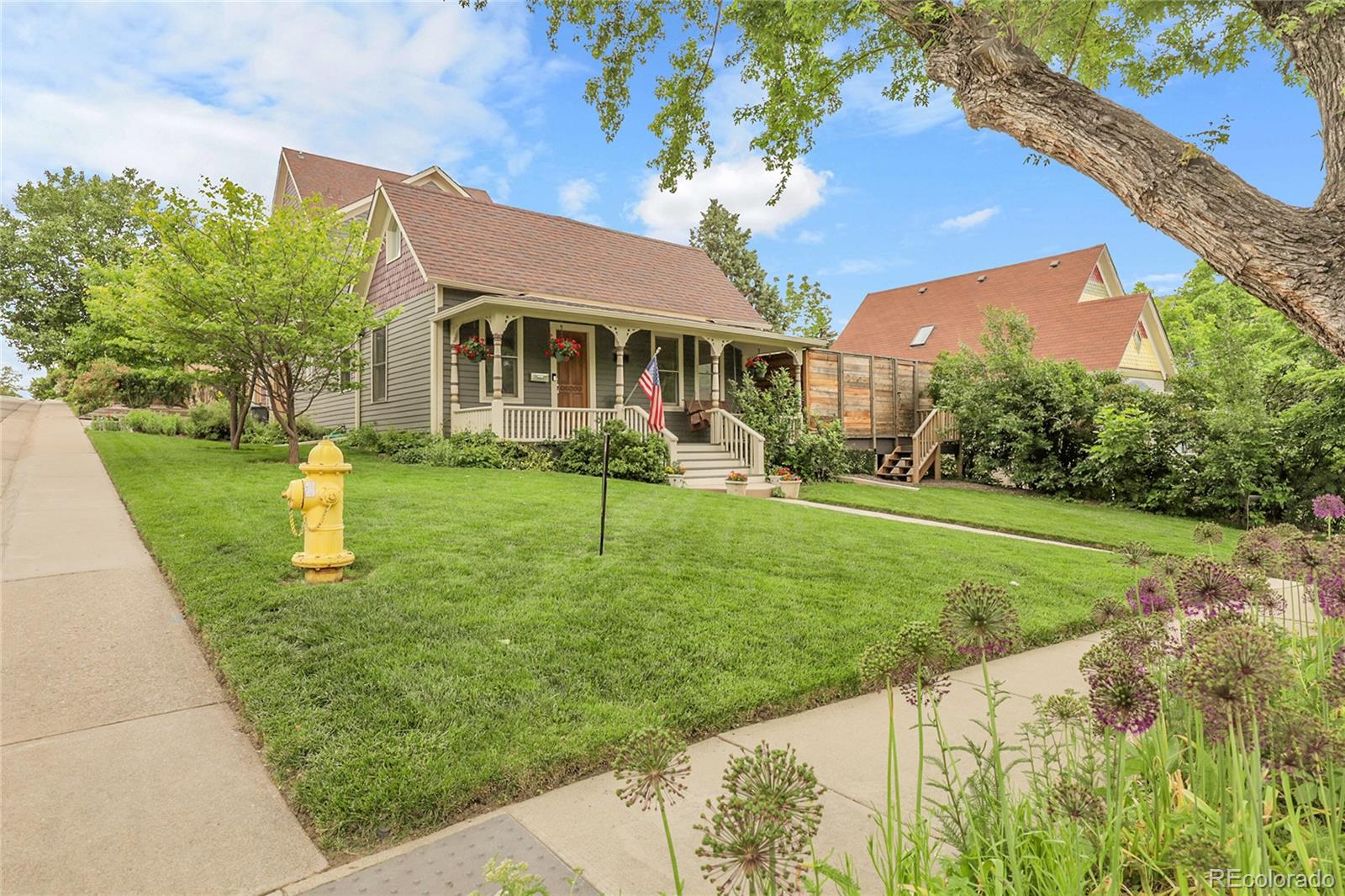 503 15th Street Golden, CO 80401 - Photo 3 of 30 a front view of a house with a yard