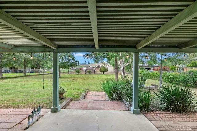 a house view with a outdoor space