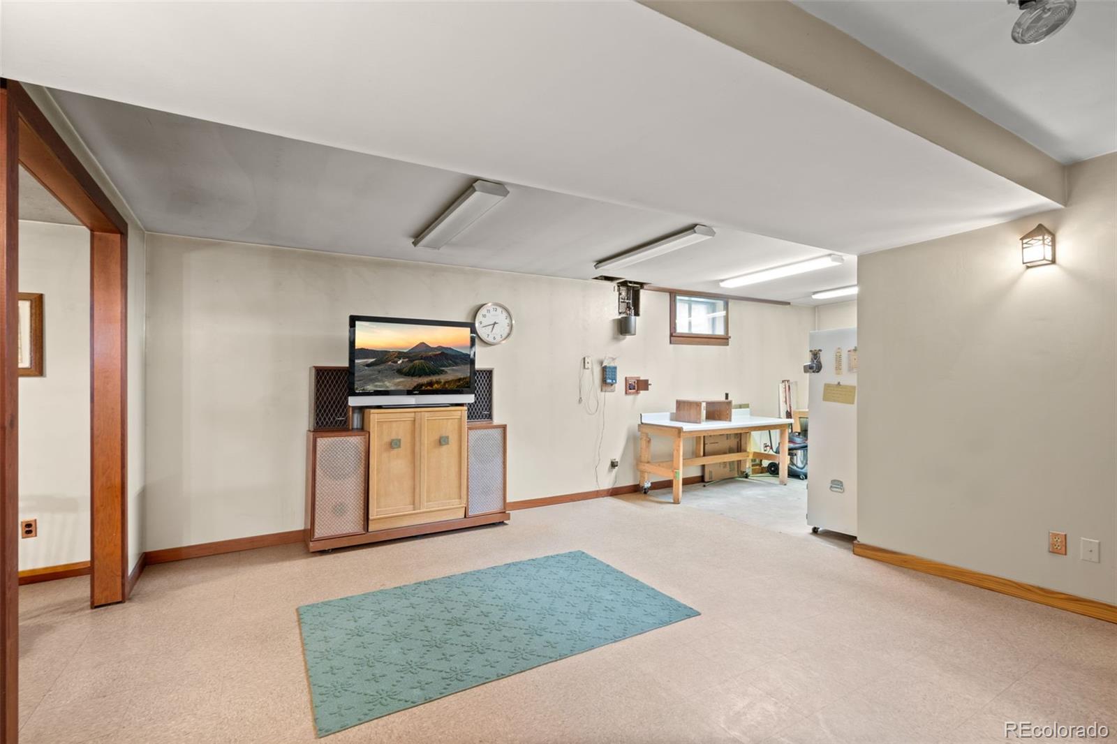 5410 Indiana Street Golden, CO 80403 - Photo 26 of 50 a view of kitchen with furniture stove and hallway