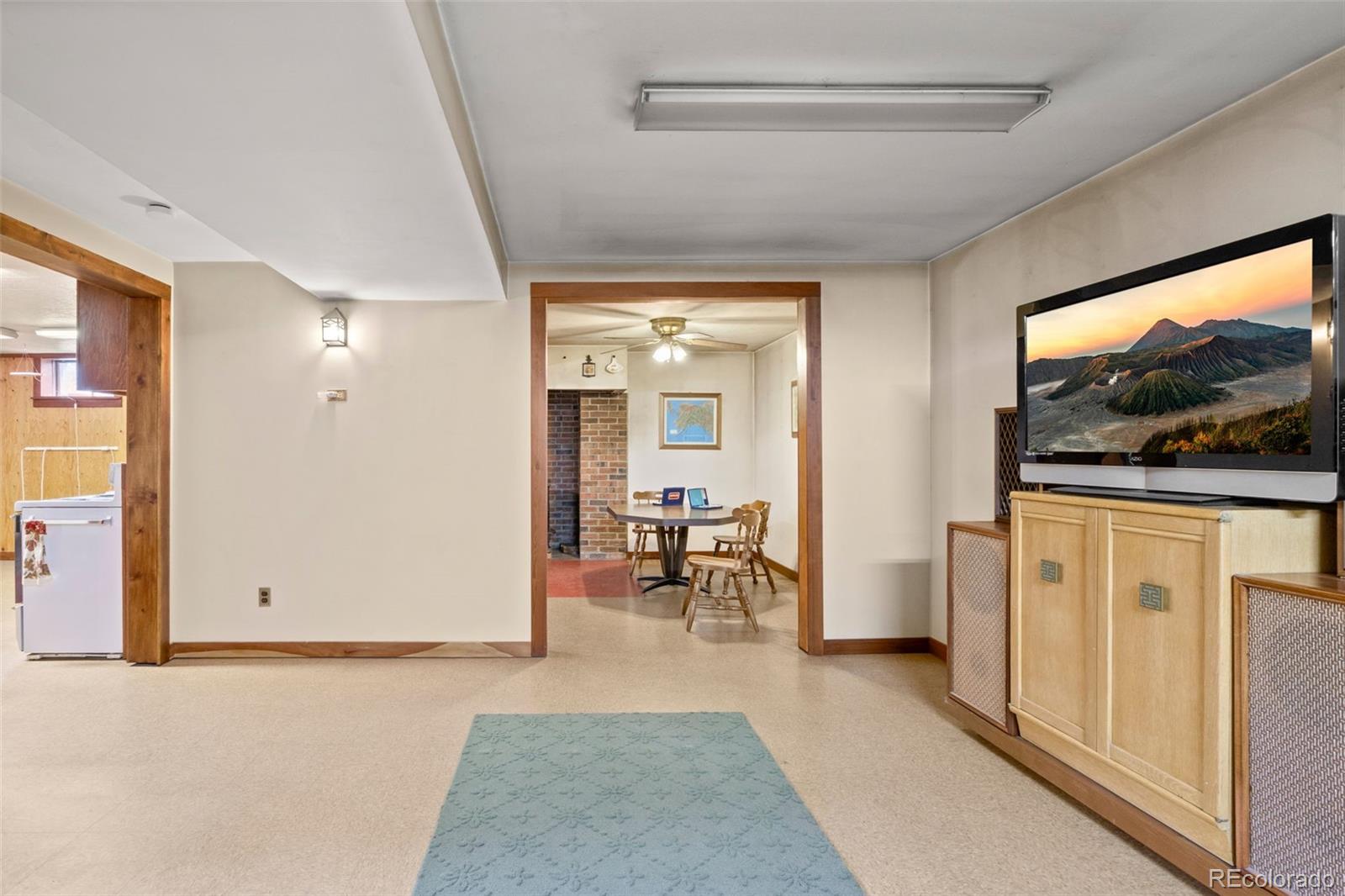 5410 Indiana Street Golden, CO 80403 - Photo 31 of 50 workspace with wooden floor and furniture