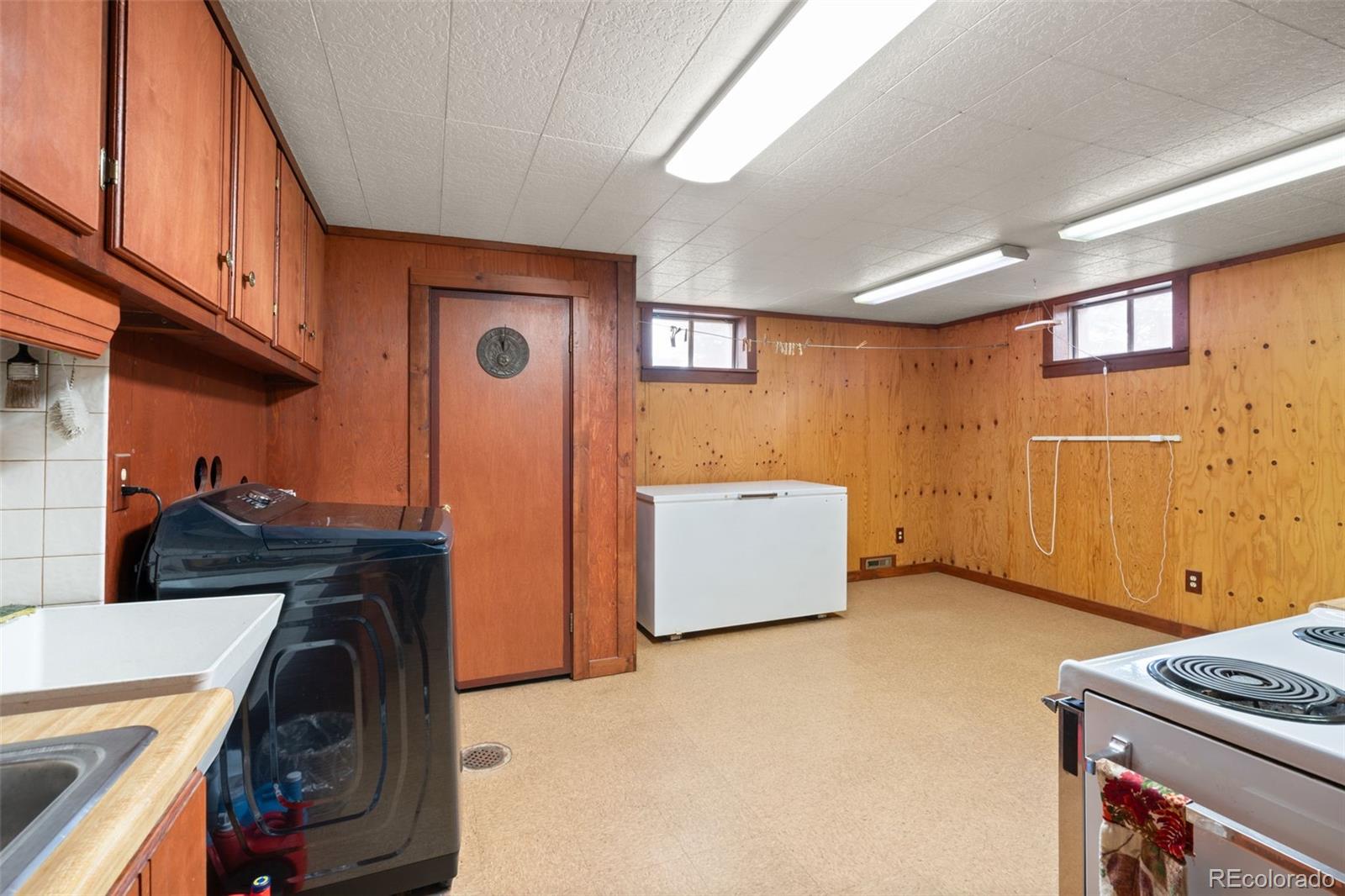 5410 Indiana Street Golden, CO 80403 - Photo 36 of 50 a utility room with dryer and washer