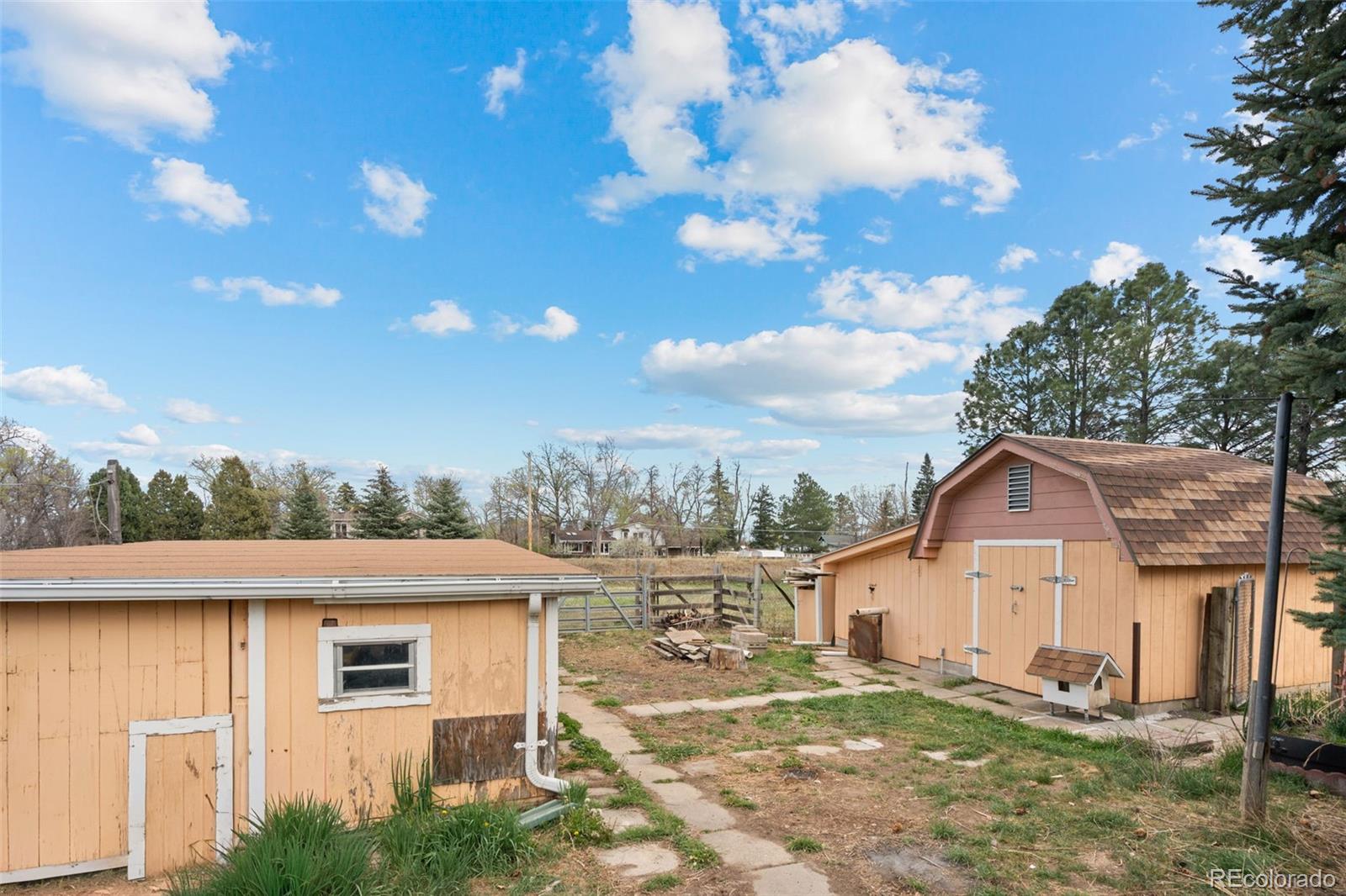 5410 Indiana Street Golden, CO 80403 - Photo 39 of 50 a view of a house with a yard